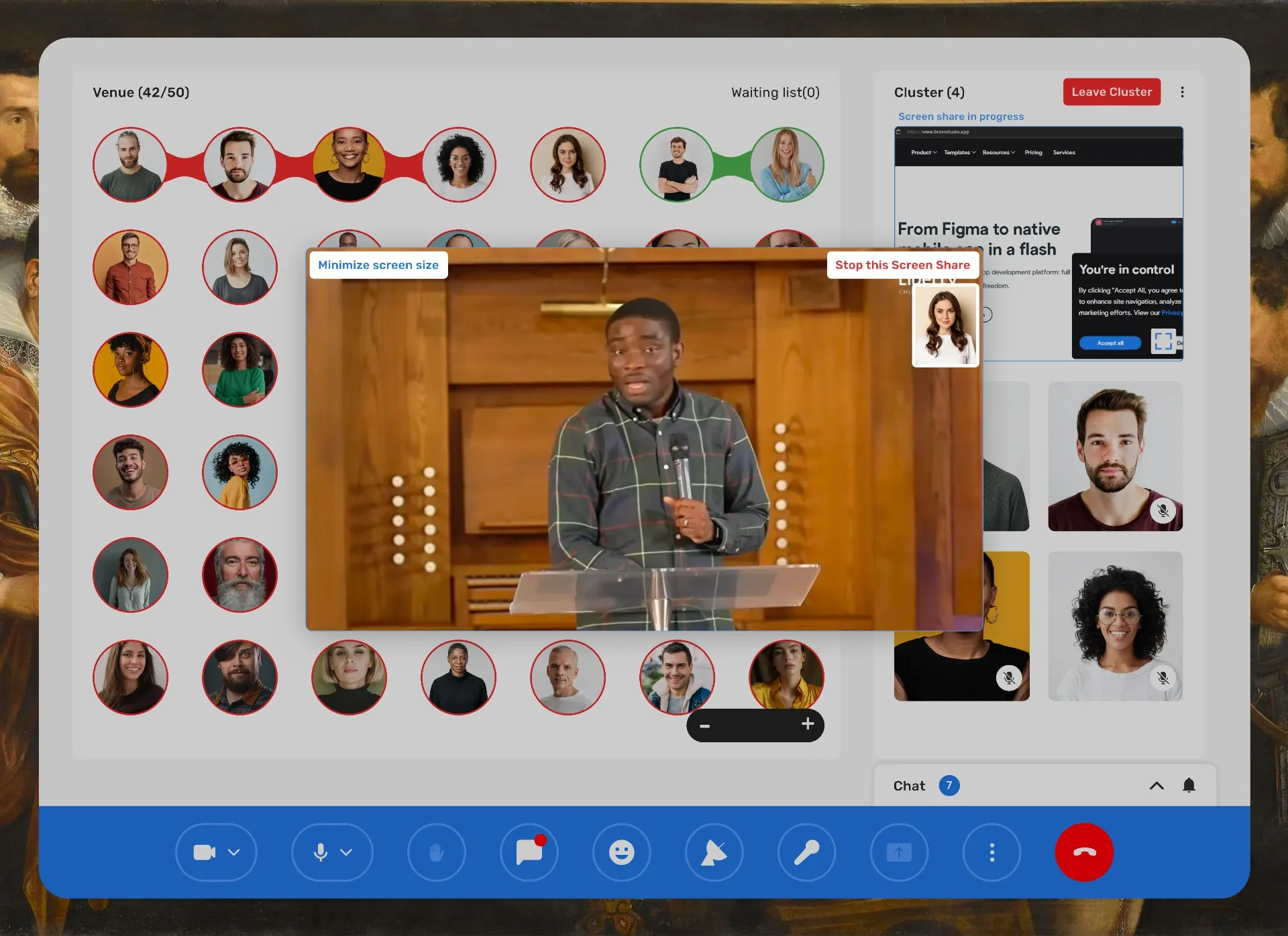 A cluster sharing a screen of a speaker on stage while the venue continues